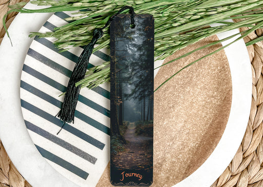 a bookmark with a picture of a path in the woods