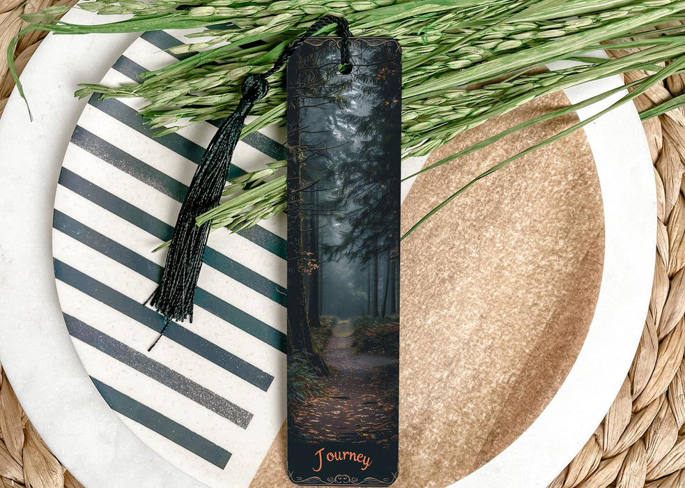 a bookmark with a picture of a path in the woods