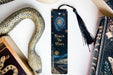a bookmark with the words reach the stars on it