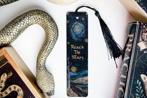 a bookmark with the words reach the stars on it