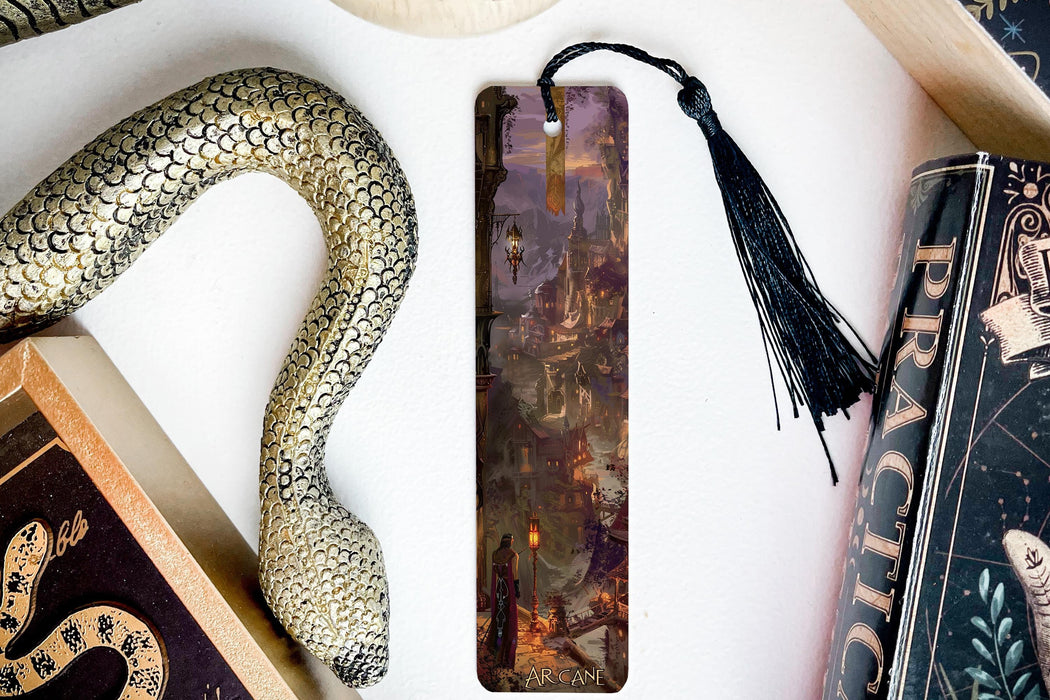 a bookmark, snake, and other items on a table