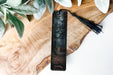 a bookmark with a forest scene on it