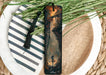 a bookmark with a picture of a person on it