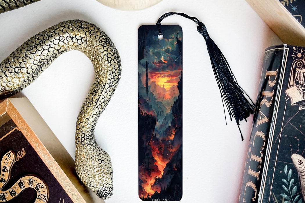 a bookmark with a picture of a fire and a snake on it