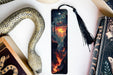 a bookmark with a picture of a fire and a snake on it