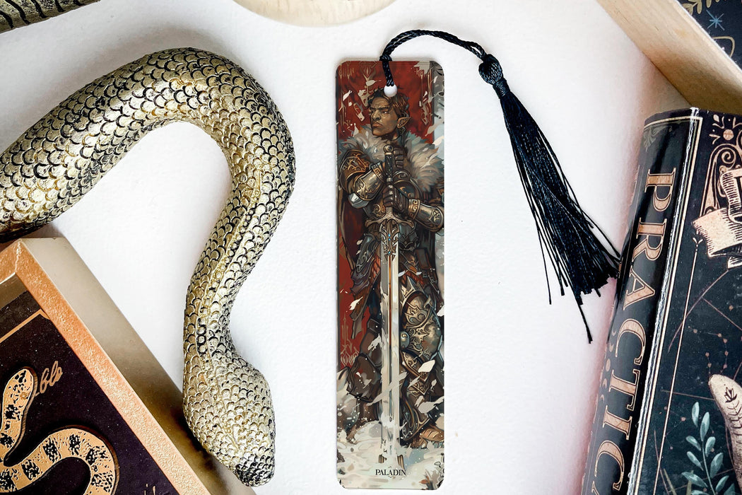 a bookmark with a picture of a man and a snake on it