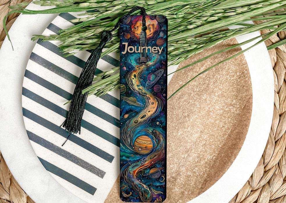 a bookmark sitting on top of a white plate