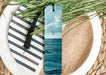 a bookmark with a picture of the ocean on it