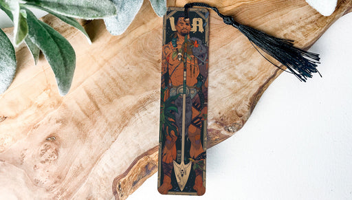 a wooden clock with a tassel hanging from it's side