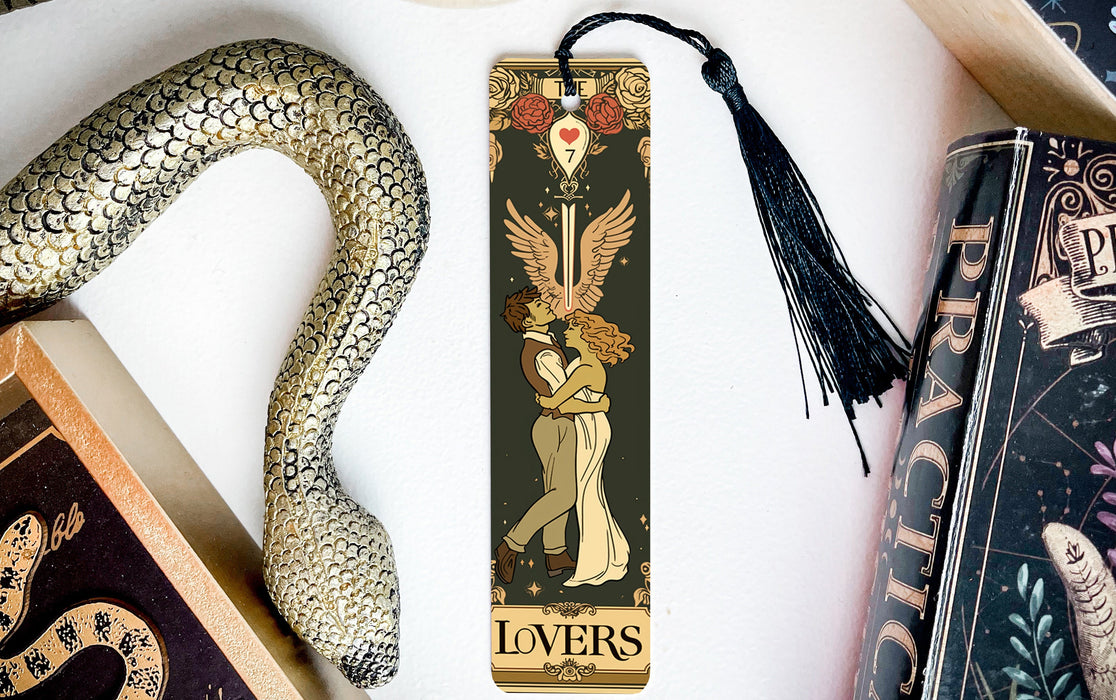 a bookmark with an image of a woman and a snake on it