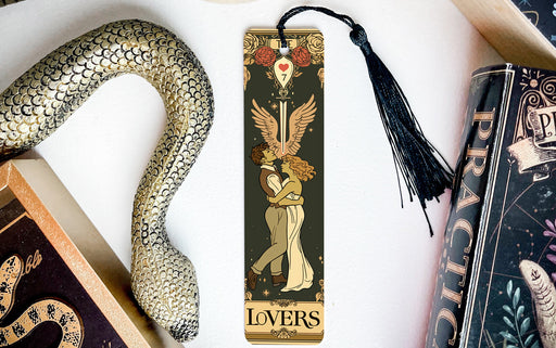 a bookmark with an image of a woman and a snake on it