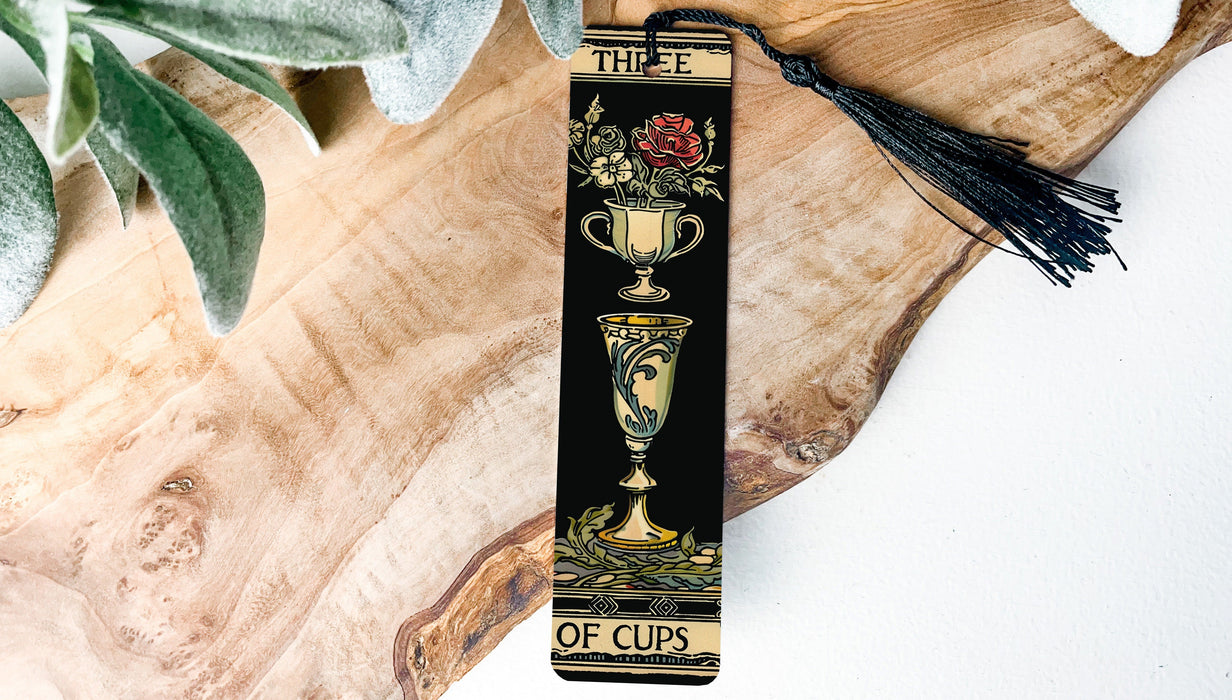 a bookmark with a tassel on top of it