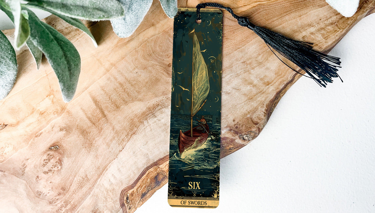 a bookmark with a picture of a sailboat on it