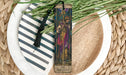 a bookmark with a picture of a man and a woman on it