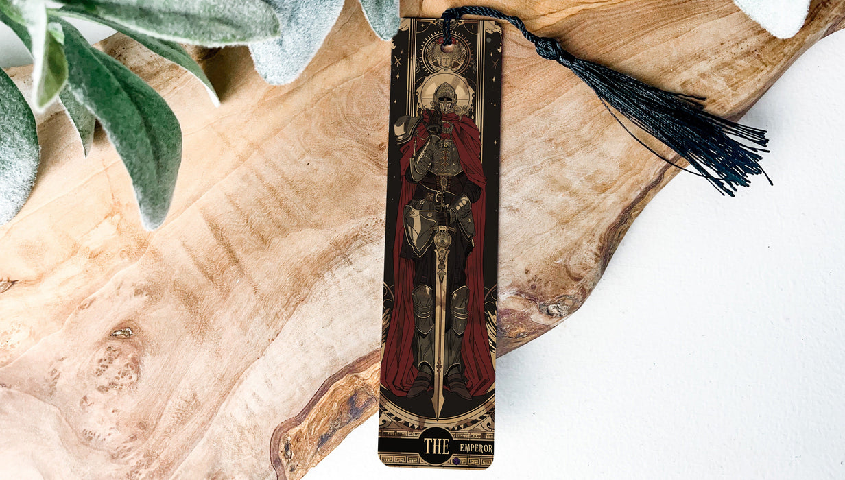 a wooden cross with a tassel hanging from it