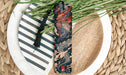 a close up of a knife on a plate