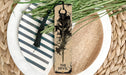 a bookmark with a picture of a demon on it