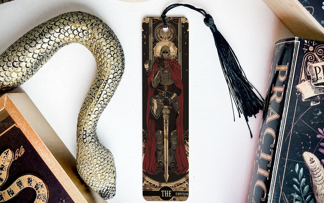 a bookmark with an image of a woman and a snake on it