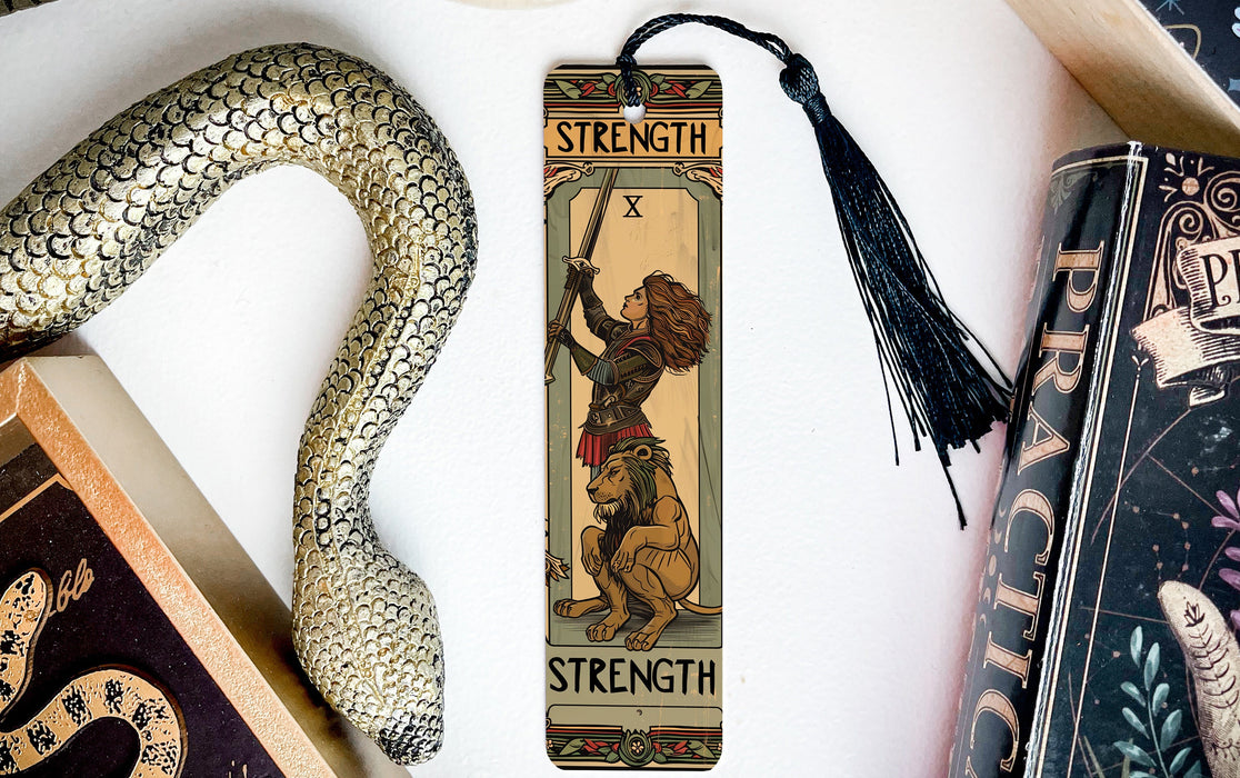 a snake, a bookmark, and a snake on a table