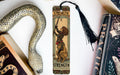 a snake, a bookmark, and a snake on a table