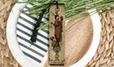 a bookmark with a picture of a man and a woman on it