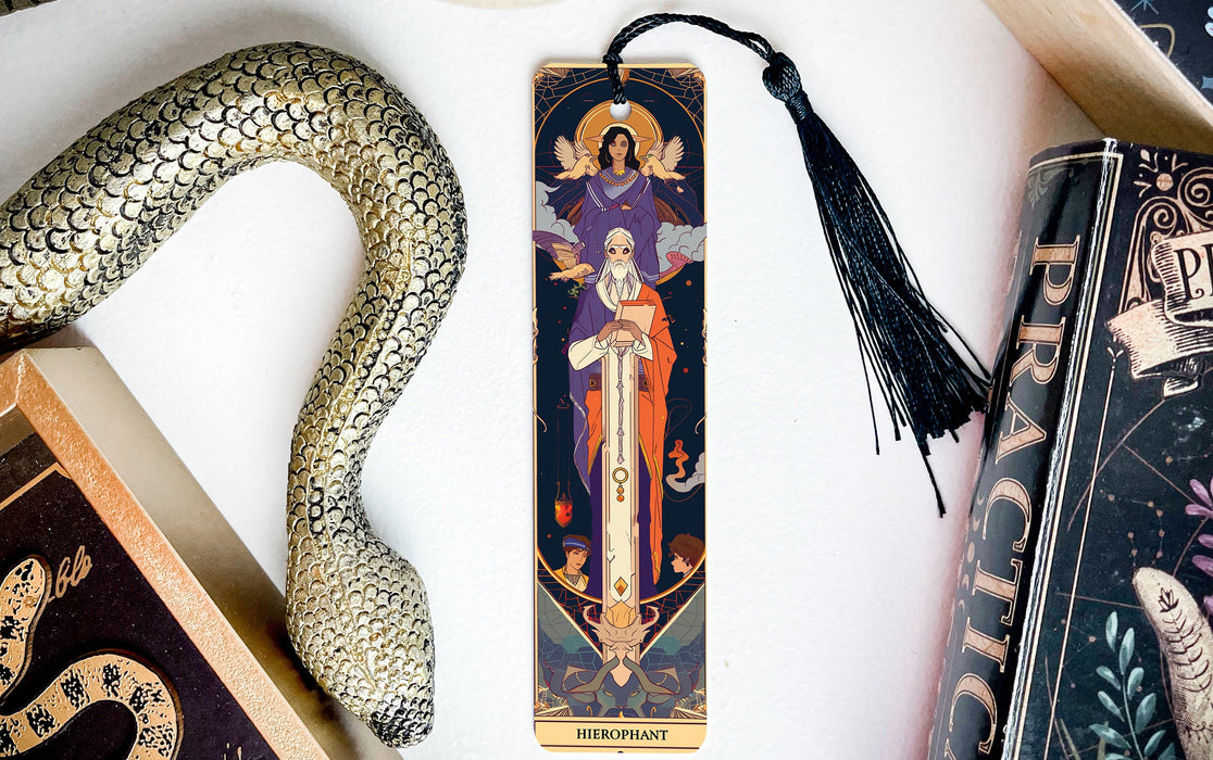 a bookmark with an image of the virgin mary and a snake