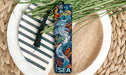 a bookmark with a picture of a sea horse on it