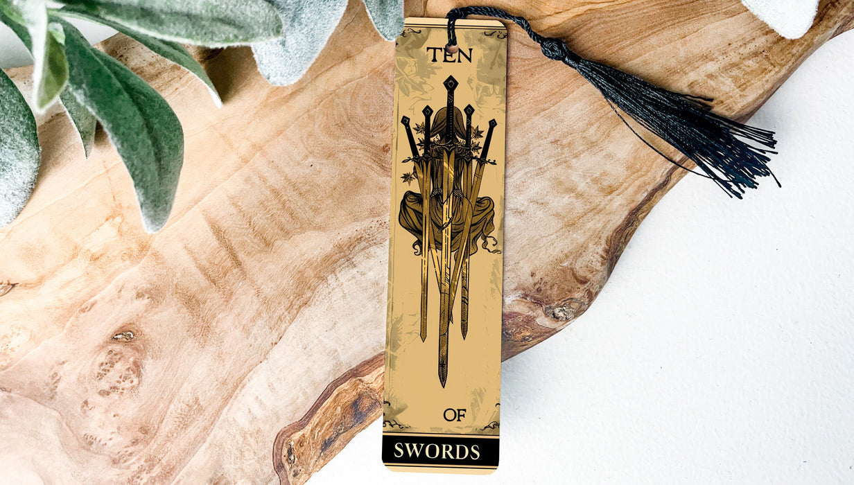 a bookmark with a tassel hanging from it