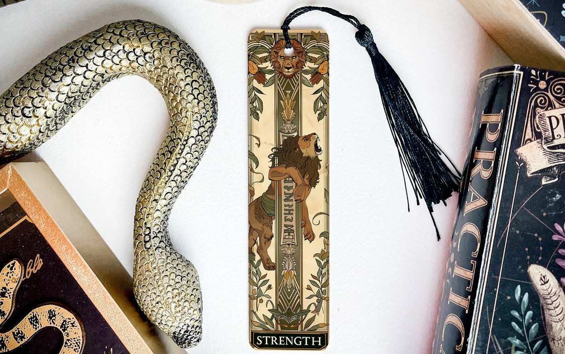 a bookmark with a snake and a snake on it