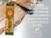 a metal bookmark with a sun design on it