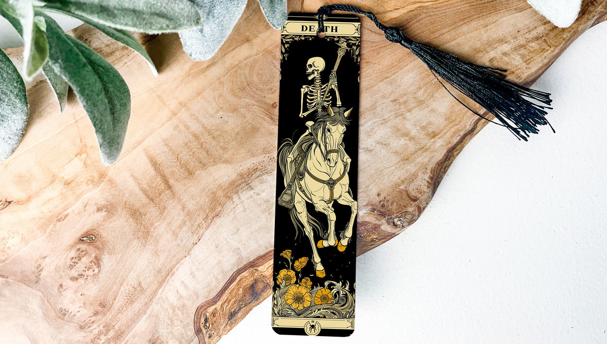 a bookmark with a skeleton riding a horse