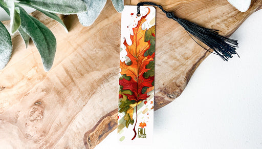 a bookmark with a picture of a leaf on it