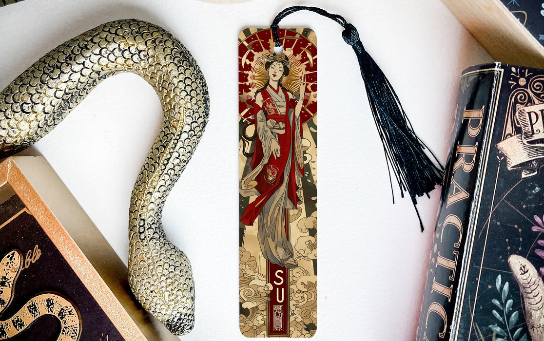 a bookmark with an image of a woman and a snake on it