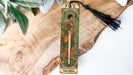 a bookmark with a picture of a man holding a sword