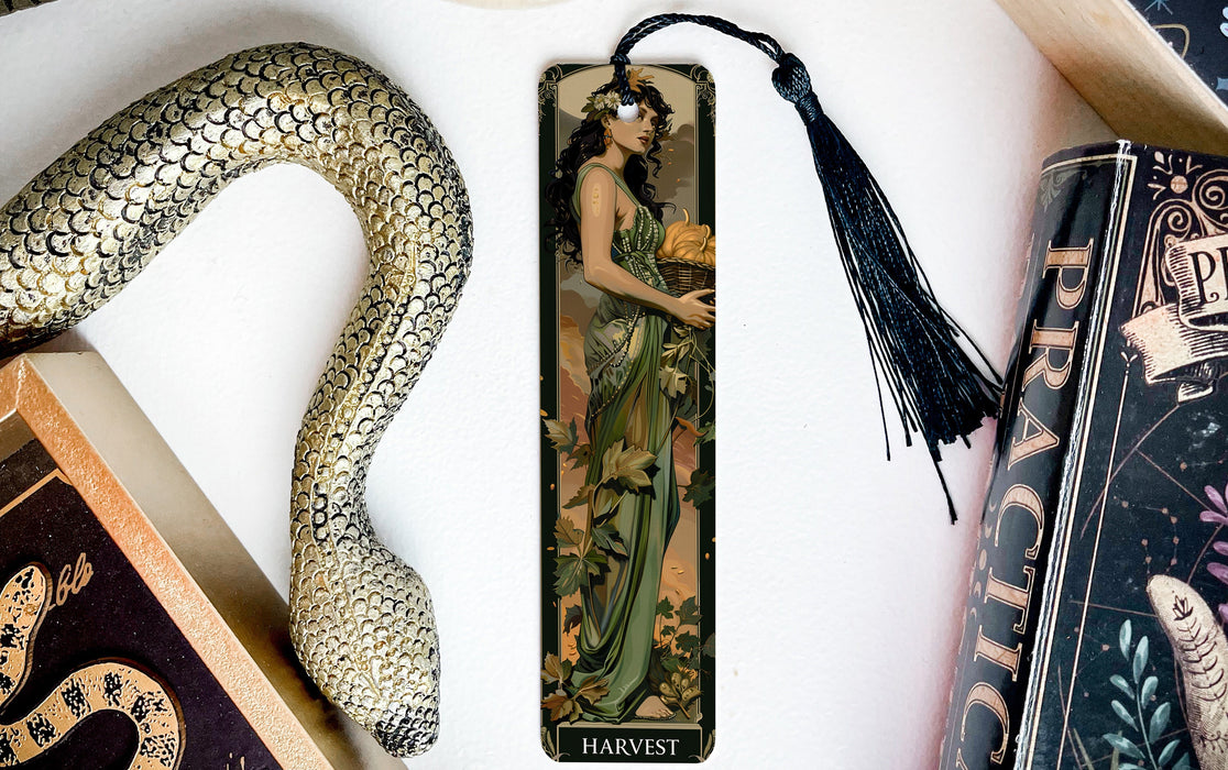 a bookmark with an image of a woman holding a snake