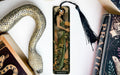 a bookmark with an image of a woman holding a snake