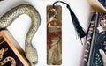 a bookmark with a picture of a woman and a snake on it