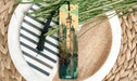a bookmark with a picture of a castle on it