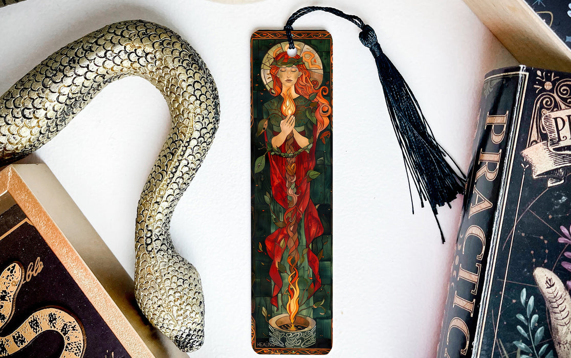 a bookmark with an image of a woman and a snake on it
