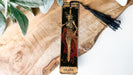 a wooden cross with a skeleton on it