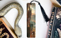 a bookmark, snake, and other items on a table
