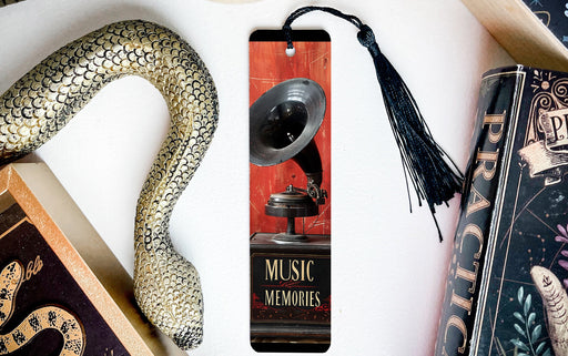 a bookmark with a horn and a snake on it