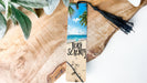 a bookmark with a picture of a beach on it