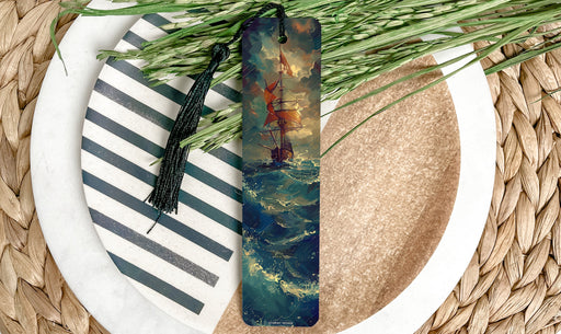 a bookmark with a painting of a ship on it