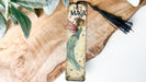 a bookmark with a picture of a fairy on it