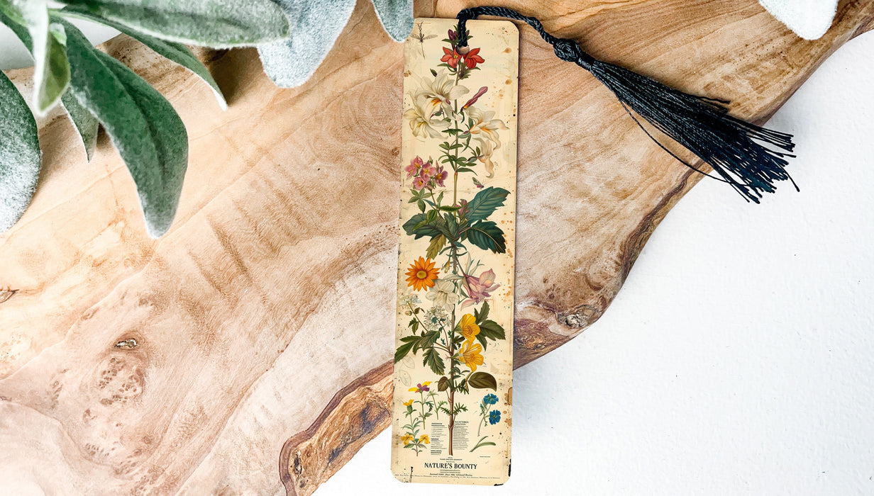 a bookmark with a tassel hanging from it