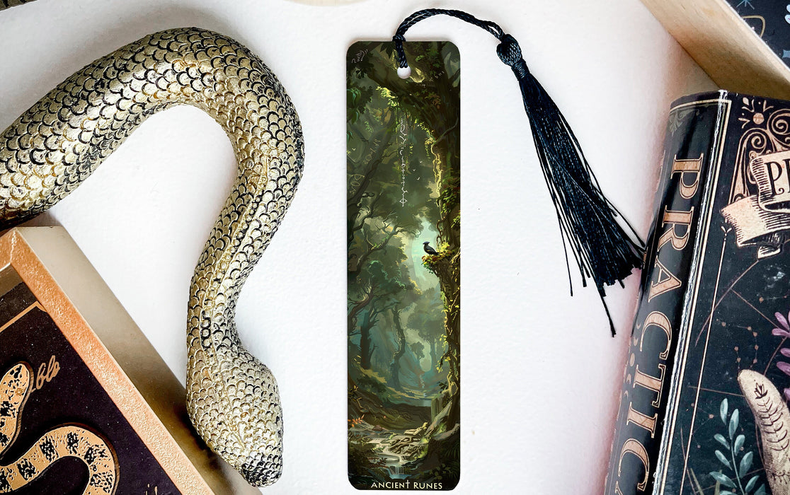 a snake, bookmarks, and other items on a table