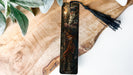 a bookmark with a picture of a man on it