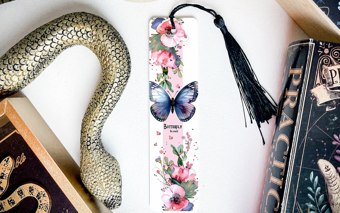 a bookmark with a butterfly and flowers on it