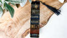 a close up of a book on a wooden table